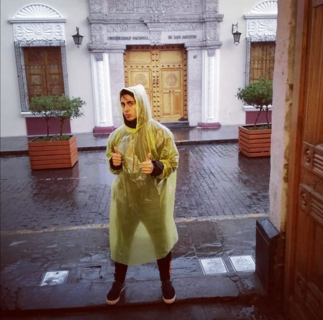 Photo of me with a poncho in the rain